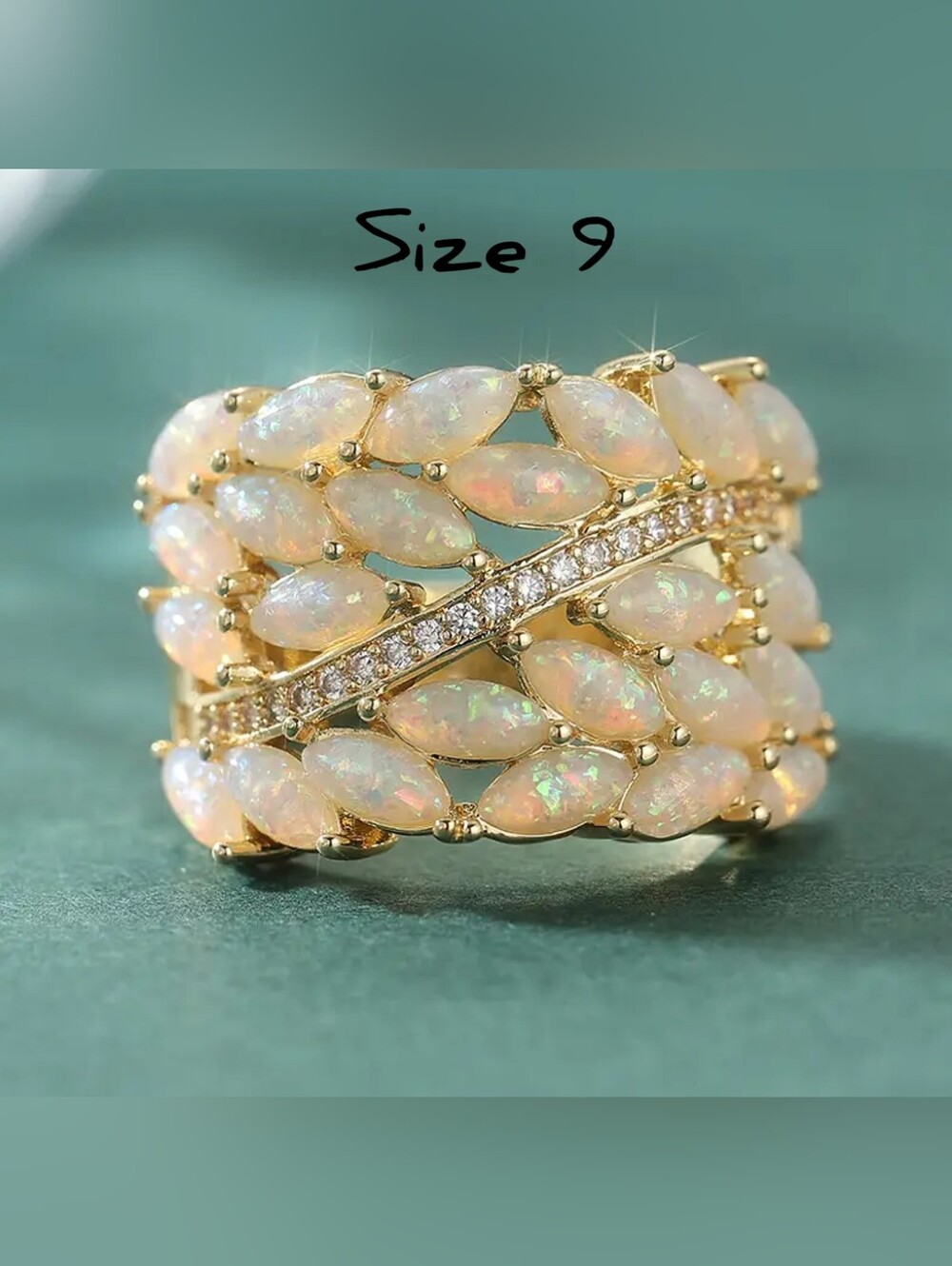 Multi row simulated White Opal with CZ's. Size 9